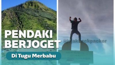 Pendaki Berjoget Di Atas Tugu Gunung Merbabu